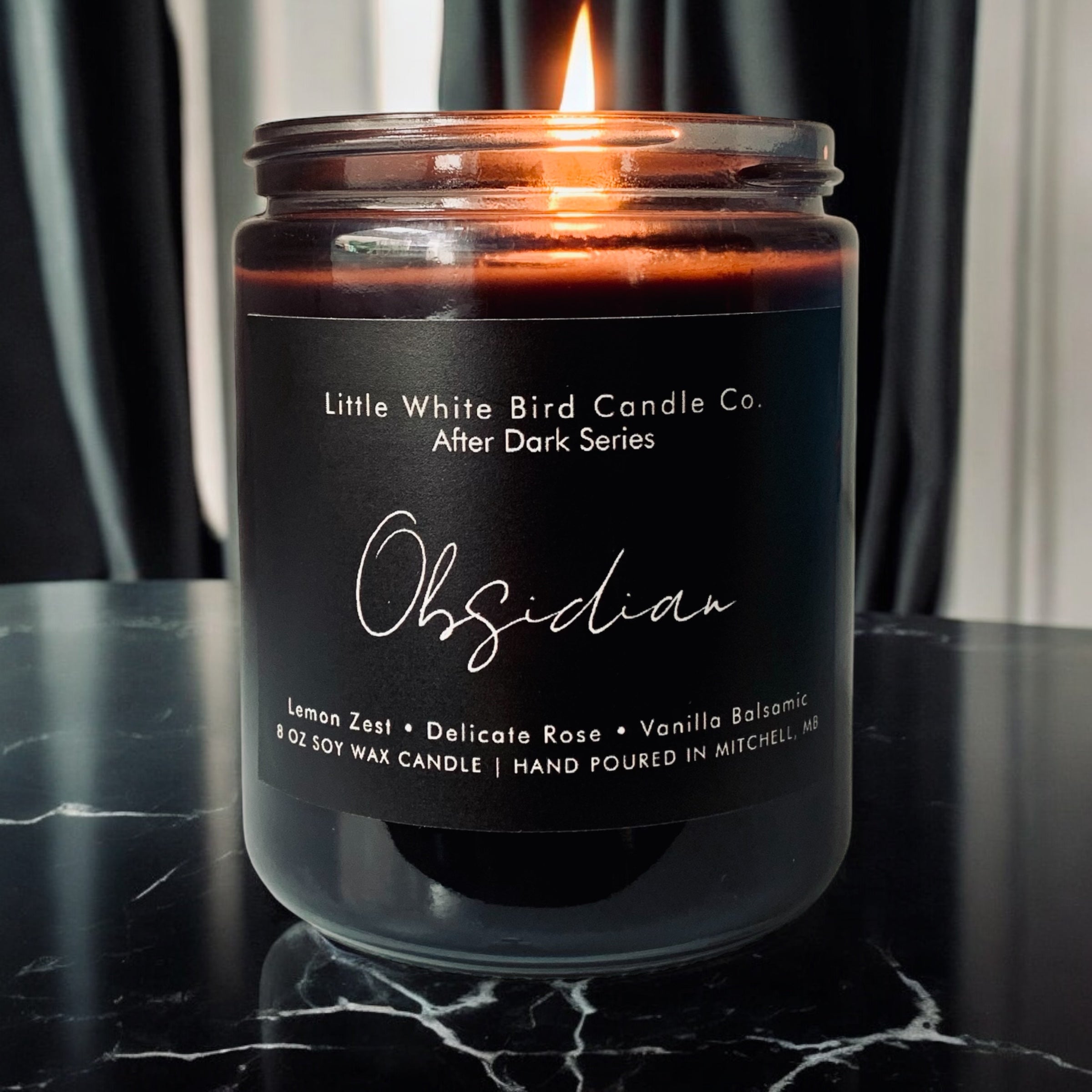 8oz Obsidian Candle • Lemon Zest • Delicate Rose • Vanilla Balsamic